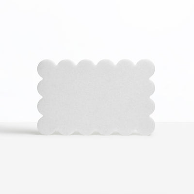 Pearl white CHOPIT chopping board with scalloped edge. Art for your kitchen
