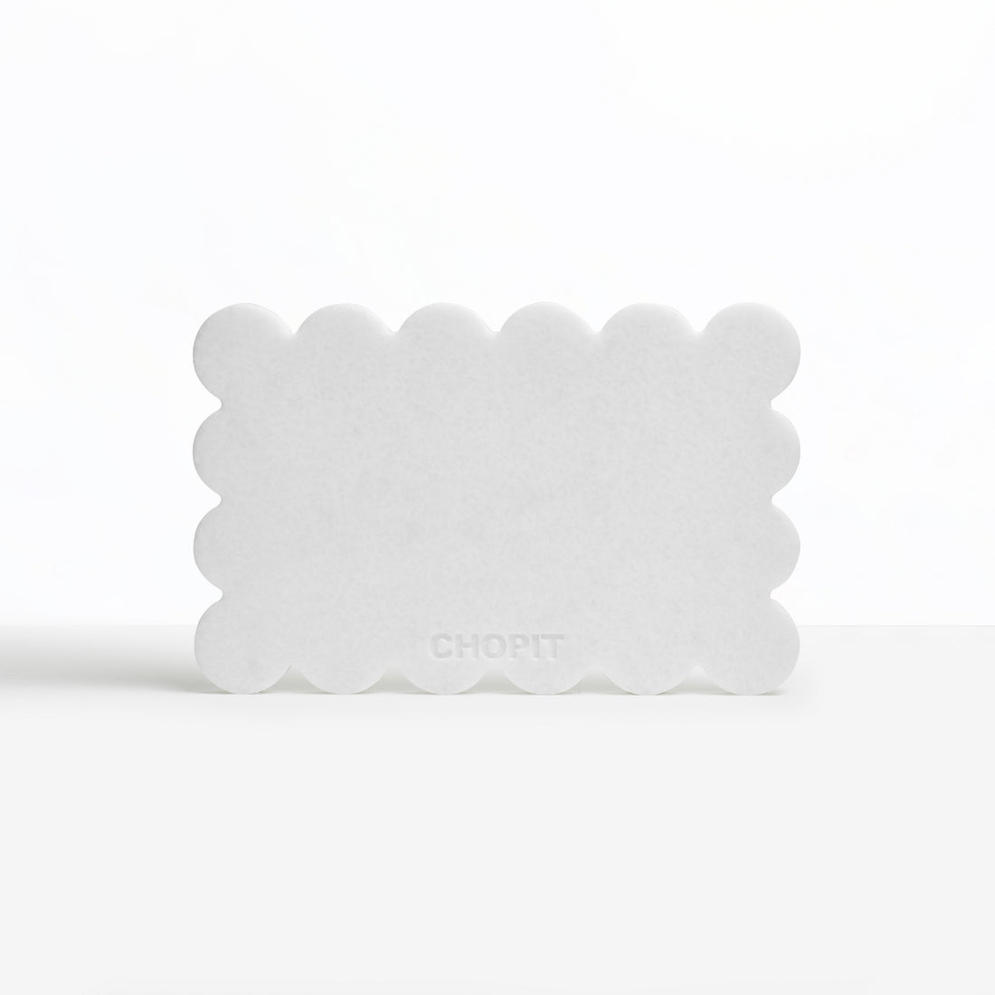 Pearl white CHOPIT chopping board with scalloped edge. Art for your kitchen